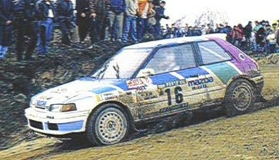 Jesús Puras - José Arrarte
25º Rallye de Portugal - Vinho do Porto 1991. Mazda 323 GTX (JYS 156). Clasificado 7º.
Mazda Rally Team Europe

Del 5 al 9 de Marzo, Portugal.
Superficie: asfalto - tierra.

El Rally tenia un total de 2041.26 Km de los que 564.20 Km divididos en 38 tramos eran especiales (2 de ellos fueron cancelados SS2 Gradil de 9 Km y SS28 Viseu de 29.90 Km).

Se inscribieron 106 equipos, tomaron la salida 95, finalizaron 28.@
Palabras clave: Mazda;GT-X;Portugal;1991