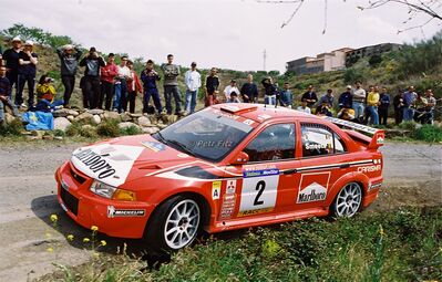 Freddy Loix - Sven Smeets
36º Rallye Catalunya - Costa Brava - Rallye de España 2000. Mitsubishi Lancer Evo VI (V22 MMR). Clasificado 8º.

Del 30 de Marzo al 2 de Abril, Lloret de Mar, Girona, Catalunya, España.
Superficie: asfalto.

El Rally tenia un total de 1874.7 km de los que 383.09 km divididos en 15 tramos eran especiales.

Se inscribieron 95 equipos, tomaron la salida 91, finalizaron 55.

© Petr Fitz
@@
Palabras clave: Catalunya;Costa_Brava;España;Spain;Mitsubishi;Lancer;Evo;2000