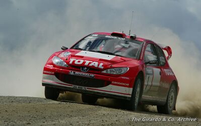 Marcus Grönholm - Timo Rautiainen
33º Propecia Rally New Zealand 2003. Peugeot 206 WRC (286 NNN 75). Clasificado 1º.

Del 10 al 13 de Abril, Auckland, Nueva Zelanda.
Superficie: tierra.

El Rally tenia un total de 1297.81 Km de los que 403.52 Km divididos en 22 tramos eran especiales.

Se inscribieron 86 equipos, tomaron la salida 80, finalizaron 46.

© The Girardo & Co. Archive
@
Palabras clave: ;Peugeot;WRC;Nueva_Zelanda;2003