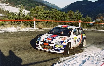 Colin McRae - Nicky Grist
69º Rallye Automobile de Monte-Carlo 2001. Ford Focus WRC 01 (V9 FMC). Abandonó por avería mecánica en SS13 Loda - Lucéram 1 de 16.55 km.

Del 18 al 21 de Enero, Mónaco.
Superficie: asfalto - nieve.

El Rally tenia un total de 1738.81 km de los que 392.18 km divididos en 15 tramos eran especiales, (una de ellas fue cancelada SS10 Comps 2 de 20.53 Km).

Se inscribieron 60 equipos, tomaron la salida 56, finalizaron 27.

© Petr Fitz
@@
Palabras clave: Ford;Focus;WRC;Montecarlo;2001