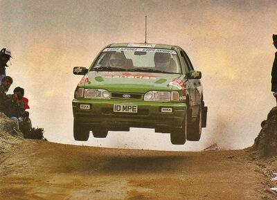 Fernando Capdevila - Alfredo RodrI­guez
25º Rallye de Portugal - Vinho do Porto 1991. Ford Sierra RS Cosworth 4x4 (10 MPE). Clasificado 13º.
Canarias Racing

Del 5 al 9 de Marzo, Portugal.
Superficie: asfalto - tierra.

El Rally tenia un total de 2041.26 Km de los que 564.20 Km divididos en 38 tramos eran especiales (2 de ellos fueron cancelados SS2 Gradil de 9 Km y SS28 Viseu de 29.90 Km).

Se inscribieron 106 equipos, tomaron la salida 95, finalizaron 28.@
Palabras clave: Ford;Sierra;Cosworth;Portugal;1991