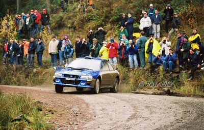 Richard Burns - Robert Reid
55º Network Q Rally de Gran Bretaña 1999. Subaru Impreza S5 WRC '99 (T 14 SRT). Clasificado 1º.

Del 21 al 23 de Noviembre, Cheltenham.
Superficie: tierra - asfalto.

El Rally tení­a un total de 1815.48 km de los que 389.39 km divididos en 22 tramos eran especiales.

Se inscribieron 186 equipos, tomaron la salida 160, finalizaron 89.

© Petr Fitz
@@
Palabras clave: Richard_Burns;Subaru;Impreza;Gran_Bretaña;WRC;1999