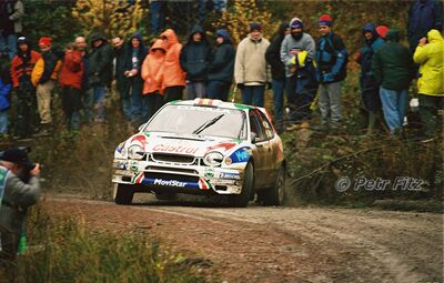 Carlos Sainz - Luis Moya
55º Network Q Rally de Gran Bretaña 1999. Toyota Corolla WRC (K-AM 792). Abandonó por la suspensión del coche en SS21 Rheola 2 de 31.47 km.

Del 21 al 23 de Noviembre, Cheltenham.
Superficie: tierra - asfalto.

El Rally tení­a un total de 1815.48 km de los que 389.39 km divididos en 22 tramos eran especiales.

Se inscribieron 186 equipos, tomaron la salida 160, finalizaron 89.

© Petr Fitz
@@
Palabras clave: ;Toyota;Corolla;WRC;Gran_Bretaña;1999