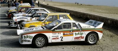 Parque Cerrado del 31º Rally RACE 1983
2# Lancia Rally 037 (TO Y63863) de Miki Biasion - Tiziano Siviero, clasificado 1º.

3# Renault 5 Turbo (1-M-2860-T) de Genito Ortiz - Ramon Minguez, clasificado 2º.

6# Porsche 911 SC de Benigno "Beny" Fernández - José Luis Sala, clasificado 3º.

11# Talbot Sunbeam Lotus de Joan Bayó - Juan Manuel "Johnny" Molina, clasificado 4º.

8# Renault 5 Turbo (O-V-5737-P) de Manuel "El Gallo" - Antonio Rodriguez "Ñota", clasificado 5º.

Al lado del Renault 5 Turbo de "El Gallo" créemos que está el 29# Seat 124 / 2000 de Vicente Cabanes - Jordà, clasificado 7º.

Del 11 al 13 de Marzo, San Juan de Alicante, Alicante, España.
Superficie: asfalto.

El Rally tenía un total de 427.80 km cronometrados.

Tomaron la salida 68 equipos, finalizaron 24.
@
Palabras clave: Race;Grupo_B;Lancia;Talbot;Sunbeam;Lotus;Renault;Turbo;Seat;Porsche;1983;Parque_Cerrado;Spain;España