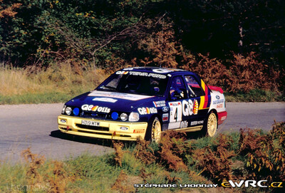 François Delecour - Daniel Grataloup
27º Rallye Catalunya - Costa Brava - Rallye de España 1991. Ford Sierra RS Cosworth 4x4 (H319 MTW). Clasificado 3º.
Q8 Team Ford

Del 10 al 13 de Noviembre, Lloret de Mar, Girona, Catalunya, España.
Superficie: asfalto - tierra.

El Rally tenia un total de 1606.98 km de los que 594.01 km divididos en 35 tramos eran especiales (2 de ellos fueron cancelados SS4 Sant Hilari - Osor de 13.57 Km y SS29 Riera de Merles de 14.36 Km).

Tomaron la salida 76 equipos, finalizaron 33.

© Stéphane Lhonnay
@
Palabras clave: Ford;Sierra;Cosworth;1991;Catalunya;España;Spain