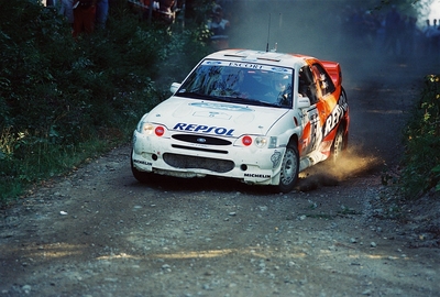 Carlos Sainz - Luis Moya
47º Neste Rally Finland 1997. Ford Escort WRC. Abandonó por la caja de cambios en SS20 Hauhanpohja 2 de 11.34 km.

Del 29 al 31 de Agosto, Jyväskylä.
Superficie: tierra.

El Rally tenia un total de 1171.79 Km de los que 381.55 Km divididos en 22 tramos eran especiales.

Se inscribieron 105 equipos, tomaron la salida 103, finalizaron 50.@
Palabras clave: ;Finlandia;Ford;Escort;WRC;1997