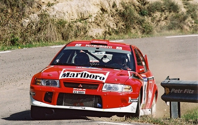 Freddy Loix - Sven Smeets
37º Rallye Catalunya - Costa Brava - Rallye de España 2001. Mitsubishi Carisma GT Evo VI (X3 MMR). Clasificado 4º.
Marlboro Mitsubishi Ralliart

Del 22 al 25 de Marzo, Lloret de Mar, Girona, Catalunya, España.
Superficie: asfalto.

El Rally tenia un total de 1779.13 km de los que 383.18 km divididos en 18 tramos eran especiales, (una de ellas fue cancelada SS12 La Riba 2 de 35.89 Km).

Se inscribieron 79 equipos, tomaron la salida 76, finalizaron 36.

© Petr Fitz
@@
Palabras clave: Mitsubishi;Catalunya;Costa_Brava;España;2001;Spain