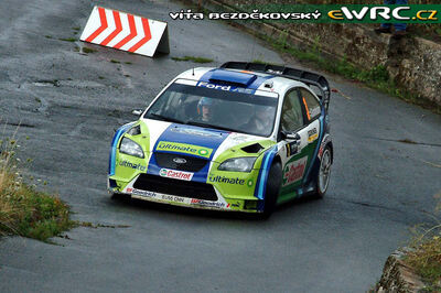 Marcus Grönholm - Timo Rautiainen
25º OMV ADAC Rallye Deutschland 2006. Ford Focus RS WRC '06 (EU55 CNN). Clasificado 3º.
BP Ford World Rally Team

Del 11 al 13 de Agosto, Trier, Rhineland-Palatinate.
Superficie: asfalto.

El Rally constaba de 3 etapas con un total de 1300.48 km de los que 349.11 km divididos en 19 tramos eran cronometrados.

Tomaron la salida 73 equipos, finalizaron 56.

© Vít Bezdekovský
@@
Palabras clave: Ford;Focus;WRC;Alemania;Deutschland;2006