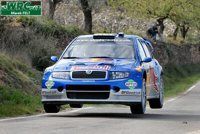 Gilles Panizzi - Hervé Panizzi
42º RallyRACC Catalunya - Costa Daurada 2006. Skoda Fabia WRC (4S5 3382). Clasificado 10º.
Red Bull Skoda

Del 24 al 26 de Marzo, Salou, Tarragona, Catalunya, España.
Superficie: asfalto.

El Rally tenia un total de 1,376.14 Km de los que 346.43 Km divididos en 16 tramos eran especiales.

Se inscribieron 71 equipos, tomaron la salida 66, finalizaron 56.

© Marek Felt
@
Palabras clave: Skoda;Fabia;WRC;Catalunya;España;Spain;2006