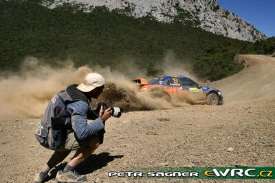 Armodios Vovos - "El-Em"
53º BP Ultimate Acropolis Rally of Greece 2006. Subaru Impreza S11 WRC '05 (LC54 WRC). Clasificado 14º.

Del 2 al 4 de Junio, Athens.
Superficie: tierra.

El Rally constabade 3 etapas con un tenia un total de 1279.29 km de los que 355.62 km divididos en 18 tramos eran cronometrados.

Se inscribieron 91 equipos, tomaron la salida 84, finalizaron 69.

© Petr Sagner
@
Palabras clave: Subaru;Impreza;WRC;Atenas;Grecia;Acropolis;2006