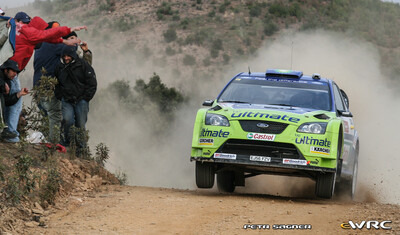 Marcus Grönholm - Timo Rautiainen
41º Vodafone Rally de Portugal 2007. Ford Focus RS WRC '06 (EJ56 FZV). Clasificado 4º.
BP Ford World Rally Team

Del 30 de Marzo al 1 de Abril, Faro.
Superficie: tierra.

El Rally constaba de 3 etapas con un total de 1009.31 km de los que 357.10 km divididos en 18 tramos, eran cronometrados.

Tomaron la salida 80 equipos, finalizaron 61.

© Petr Sagner
@@
Palabras clave: ;Ford;Focus;WRC;Portugal;2007