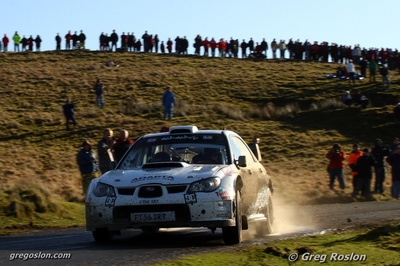 Mads Østberg - Jonas Andersson
66º Wales Rally GB 2010. Subaru Impreza S12B WRC '07 (FT56 SRT). Clasificado 9º.
Adapta AS

Del 10 al 14 de Noviembre, Cardiff.
Superficie: tierra.

El Rally teni­a un total de 1598.74 km de los que 344.66 km divididos en 3 etapas y 20 tramos eran cronometrados.

Se inscribieron 63 equipos, tomaron la salida 61, finalizaron 45.

© Greg Roslon
@@
Palabras clave: Subaru;Impreza;WRC;Gran_Bretaña;2010