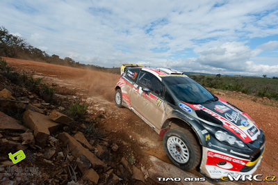 Martin Prokop - Zdenek Hruza
46º Vodafone Rally de Portugal 2012. Ford Fiesta RS WRC (06R 0030). Clasificado 5º.
Czech Ford National Team

Del 29 de Marzo al 1 de Marzo, Faro.
Superficie: tierra.

El Rally tenia un total de 1497.92 km de los que 434.77 km divididos en 4 etapas y 22 tramos eran cronometrados (3 de ellos fueron cancelados SS8 Tavira 2 de 25.0 km, SS9 Alcarias 2 de 25.2 km, SS10
São Brás de Alportel 2 de 16.2 km).

Tomaron la salida 51 equipos, finalizaron 30.

© Timo Anis
@
Palabras clave: ;Ford;Fiesta;WRC;Portugal;2012