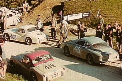 18º Rallye International des Alpes 1956
Durante un control

Nº 412 es el Triumph TR3 de Maurice Gatsonides - Ed Pennybacker, Clasificado 8º.

Nº 408 es el Triumph TR3 de Paddy Hopkirk - Willy Cave, Clasificado 13º.

Nº 402 es el Alfa Romeo 1900 SS Zagato de Jean Claude George - Guyot, abandonó.

De 6 al 13 de Julio, Marseille - Zagreb - Marseille.
Superficie: asfalto.

Tomaron la salida 80 equipos, finalizaron 34.
Palabras clave: Triumph;Alfa_Romeo;Alpes;1956