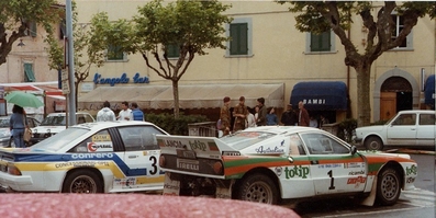 Parque Cerrado del 16º Rallye dell'Isola d'Elba 1984
En Portoferraio Provincia de Livorno (Toscana), la ciudad mas importante de la Isla d'Elba.

En primera linea el Lancia Rally 037 de Adartico Vudafieri - Luigi Pirollo, clasificado 4º.

Al lado el Opel Manta 400 de Dario Cerrato - Giuseppe Cerri, clasificado 3º.

Del 7 al 9 de Junio, Portoferraio, Italia.
Superficie: asfalto - tierra.

Tomaron la salida 54 equipos, finalizaron 24.
@
Palabras clave: Lancia;Opel;Grupo_B;Parque_Cerrado;Elba;1984