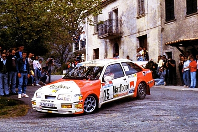 Carlos Sainz Cenamor - Antonio Boto
31º Tour de Corse - Rallye de France 1987. Ford Sierra RS Cosworth (V-9614-BZ). Clasificado 7º.

Del 7 al 9 de Mayo, Ajaccio, Córcega, Francia.
Superficie: asfalto.

El Rally tenia un total de 1367.02 km de los que 618.20 km divididos en 24 tramos eran especiales.

Se inscribieron 103 equipos, tomaron la salida 95, finalizaron 35.@
Palabras clave: ;Ford;Sierra;Cosworth;Corcega;1987;Corse