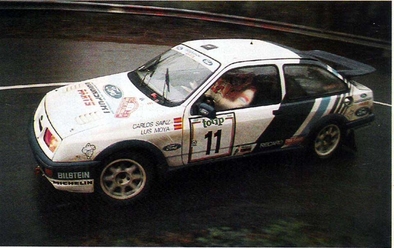 Carlos Sainz Cenamor - Luís Rodríguez Moya
30º Rallye Sanremo - Rallye d'Italia 1988. Ford Sierra RS Cosworth (D373 TAR). Clasificado 5º.
Ford Motor Co. Ltd.

Del 10 al 14 de Octubre, Sanremo, Liguria, Imperia, Italia.
Superficie: asfalto - tierra.

El Rally tenia un total de 2453.87 km de los que 564.96 Km divididos en 43 tramos eran especiales (4 de ellos fueron cancelados SS6 Superspeciale 2 de 2.18 Km, SS11 Tignai de 12.17 Km, SS13 Lanzo 2 de 6.38 Km y SS38 Angua 2 de 12.37 Km).

Se inscribieron 124 equipos, tomaron la salida 124, finalizaron 55.@
Palabras clave: Luis_Moya;Ford;Sierra;Cosworth;Sanremo;Italia;1988