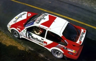 Carlos Sainz Cenamor - Luís Rodríguez Moya
22º Rallye de Portugal - Vinho do Porto 1988. Ford Sierra RS Cosworth (V-7853-BX). Abandonó por motor en SS3 Figueiró dos Vinhos de 20.50 km.

Del 1 al 5 de Marzo, Estoril, Portugal.
Superficie: asfalto - tierra.

El Rally tenia un total de 2105.42 km de los que 588.70 km divididos en 37 tramos eran especiales.

Tomaron la salida 99 equipos, finalizaron 35.@
Palabras clave: ;Ford;Sierra;Cosworth;Portugal;1988