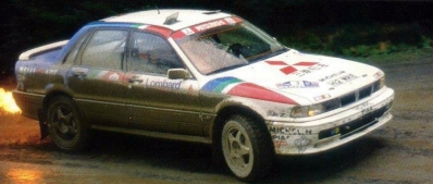Kenneth Eriksson - Staffan Parmander
47º Lombard RAC Rally 1991. Mitsubishi Galant VR-4 (H12 MRE). Clasificado 2º.

Del 24 al 28 de Noviembre, Harrogate, Yorkshire, Inglaterra.
Superficie: tierra.

El Rally tenia un total de 2355.31 Km de los que 565,51 Km divididos en 37 tramos eran especiales.

Se inscribieron 160 equipos, tomaron la salida 151, finalizaron 82.@
Palabras clave: ;Mitsubishi;Galant;VR-4;Gran_Bretaña;RAC_Rally;Lombard;1991