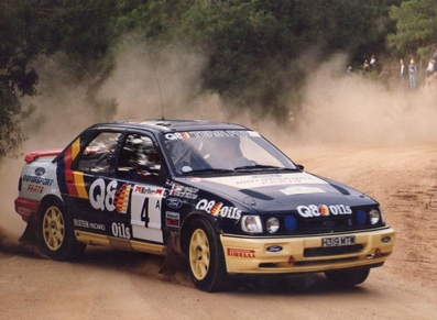 François Delecour - Daniel Grataloup
27º Rallye Catalunya - Costa Brava - Rallye de España 1991. Ford Sierra RS Cosworth 4x4 (H319 MTW). Clasificado 3º.
Q8 Team Ford

Del 10 al 13 de Noviembre, Lloret de Mar, Girona, Catalunya, España.
Superficie: asfalto - tierra.

El Rally tenia un total de 1606.98 km de los que 594.01 km divididos en 35 tramos eran especiales (2 de ellos fueron cancelados SS4 Sant Hilari - Osor de 13.57 Km y SS29 Riera de Merles de 14.36 Km).

Tomaron la salida 76 equipos, finalizaron 33.

Foto en SS31 Lloret de Mar de 14.75 km (Lloret Verd)

© Joan Al
@
Palabras clave: Ford;Sierra;Cosworth;1991;Catalunya;España;Spain