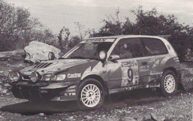 Mike Kirkland - Surinder Thatthi
39º Martini Safari Rally Kenya 1991. Nissan Sunny GTI-R (H3 NME). Clasificado 7º.
Nissan Motorsports Europe

Del 27 de Marzo al 1 de Abril, Nairobi, Kenya, África.
Superficie: tierra.

El Rally tenia un total de 4520.76 km con 79 controles horarios.

Tomaron la salida 57 equipos, finalizaron 27.@
Palabras clave: Safari;Nissan;Sunny;1991