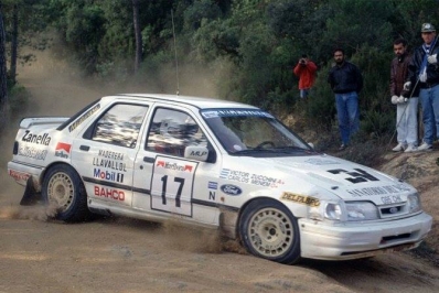 Carlos Menem Jr. - Victor H. Zucchini
27º Rallye Catalunya - Costa Brava - Rallye de España 1991. Ford Sierra Cosworth 4x4 (G95 CHK). clasificado 11º.
Mike Little Preparations

Del 10 al 13 de Noviembre, Lloret de Mar, Girona, Catalunya, España.
Superficie: asfalto - tierra.

El Rally tenia un total de 1606.98 km de los que 594.01 km divididos en 35 tramos eran especiales, (2 de ellas fueron canceladas SS4 Sant Hilari - Osor de 13.57 Km y SS29 Riera de Merles de 14.36 Km).

Tomaron la salida 76 equipos, finalizaron 33.@
Palabras clave: Menem;Ford;Sierra;Cosworth;Catalunya;Costa_Brava;1991;España;Spain