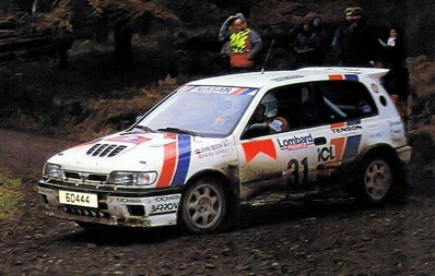 John Bosch - Kevin Gormley
47º Lombard RAC Rally 1991. Nissan Sunny GTI-R (60444). Clasificado 27º.

Del 24 al 28 de Noviembre, Harrogate, Yorkshire, Inglaterra.
Superficie: tierra.

El Rally tenia un total de 2355.31 Km de los que 565,51 Km divididos en 37 tramos eran especiales.

Se inscribieron 160 equipos, tomaron la salida 151, finalizaron 82.@
Palabras clave: Nissan;Sunny;GTI-R;Gran_Bretaña;RAC_Rally;Lombard;1991