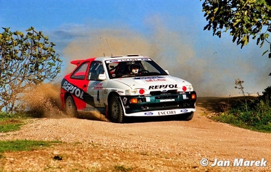 Carlos Sainz Cenamor - Luís Moya
38º Rallye Sanremo - Rallye d'Italia 1996. Ford Escort RS Cosworth (N5 FMC). Clasificado 2º.
Ford Motor Co. Ltd.

Del 13 al 16. 10 de Octubre, Sanremo, Liguria, Imperia, Italia.
Superficie: asfalto - tierra.

El Rally tenia un total de 1958.12 km de los que 413.32 km divididos en 18 tramos eran especiales (una de ellas fue cancelada SS1 Nerbisci 1 de 32.17 Km a causa del fuerte accidente de Tommi Mäkinen - Seppo Harjanne del que por suerte salieron ilesos).

Tomaron la salida 108 equipos, finalizaron 47.

© Jan Marek
@
Palabras clave: Luis_Moya;Ford;Escort;Cosworth;Sanremo;1996