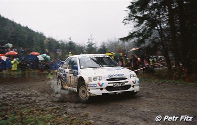 Juha Kankkunen - Juha Repo
54º Network Q Rally de Gran Bretaña 1998. Ford Escort WRC (R6 FMC). Clasificado 2º.

Del 22 al 24 de Noviembre, Cheltenham, Inglaterra.
Superficie: tierra - asfalto.

El Rally tenia un total de 1175.90 km de los que 383.85 km divididos en 28 tramos eran especiales.

Tomaron la salida 168 equipos, finalizaron 82.

© Petr Fitz
@@
Palabras clave: ;Ford;Escort;WRC;Gran_Bretaña;1998;Inglaterra