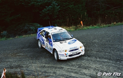 Bruno Thiry - Stéphane Prévot
54º Network Q Rally de Gran Bretaña 1998. Ford Escort WRC (P9 FMC). Clasificado 3º.

Del 22 al 24 de Noviembre, Cheltenham, Inglaterra.
Superficie: tierra - asfalto.

El Rally tenia un total de 1175.90 km de los que 383.85 km divididos en 28 tramos eran especiales.

Tomaron la salida 168 equipos, finalizaron 82.

© Petr Fitz
@@
Palabras clave: Bruno_Thiry;Ford;Escort;WRC;Gran_Bretaña;1998;Inglaterra