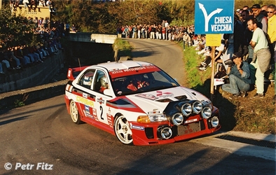 Richard Burns - Robert Reid
40º Rallye Sanremo - Rallye d'Italia 1998. Mitsubishi Carisma GT Evo V (R2 MRE). Clasificado 7º.

Del 12 al 14 Octubre, Sanremo, Imperia, Liguria, Italia.
Superficie: asfalto.

El Rally tenia un total de 1494.80 Km de los que 400.30 km divididos en 24 tramos eran especiales.

Se inscribieron 160 equipos, tomaron la salida 153, finalizaron 76.

© Petr Fitz.
@@
Palabras clave: Richard_Burns;Mitsubishi;Carisma;Evo_V;Sanremo;1998
