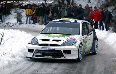 François Duval - Stéphane Prévot
72º Rallye Automobile de Monte-Carlo 2004. Ford Focus RS WRC 03 (EK52 LNP). Clasificado 3º.

Del 23 al 25 de Enero, Monaco.
Superficie: asfalto.

El Rally tenia un total de 1,331.92 Km de los que 389.12 Km divididos en 15 tramos, eran especiales (2 de ellos fueron cancelados SS1 Selonnet - Breziers 1 de 22.64 Km y SS10 Tourette du Chateau - St Antonin 2 de 24.80 Km. Uno de ellos se dio con tiempo de tramo teórico a todos los equipos, SS8 Tourette du Chateau - St Antonin 1 de 24.80 Km).

Se inscribieron 45 equipos, tomaron la salida 43, finalizaron 20.@
Palabras clave: Ford;Focus;WRC;Montecarlo;2004;nieve