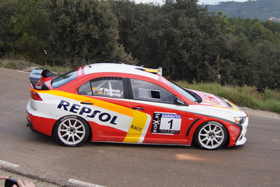 Josep Mª Membrado - Jordi Vilamala
54º Rallye 2000 Viratges 2014. Mitsubishi Lancer Evo X. Clasificado 1º.

El Rally tenia 88.26 Km cronometrados divididos en 10 tramos.
Tomaron la salida 99 equipos, 60 de ellos para el Campeonato de Catalunya Velocidad, 27 Regularidad y 12 de ECOseries.

Foto en A1 Taurons.
Palabras clave: 2000_Viratges;Manresa;Biela_Club_Manresa;2014
