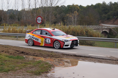 Josep Mª Membrado - Jordi Vilamala
54º Rallye 2000 Viratges 2014. Mitsubishi Lancer Evo X (5064 HCR). Clasificado 1º.
Escudería Gironella

El Rally tenia 88.26 Km cronometrados divididos en 10 tramos.
Tomaron la salida 99 equipos, 60 de ellos para el Campeonato de Catalunya Velocidad, 27 Regularidad y 12 de ECOseries.

Foto en B2 Vilaredes.
Palabras clave: 2000_Viratges;Manresa;Biela_Club_Manresa;2014