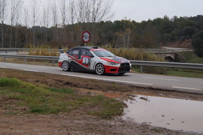 Carles Llinas - Kiko Torra
54º Rallye 2000 Viratges 2014. Mitsubishi Lancer Evo X.
Clasificado 3º.

El Rally tenia 88.26 Km cronometrados divididos en 10 tramos.
Tomaron la salida 99 equipos, 60 de ellos para el Campeonato de Catalunya Velocidad, 27 Regularidad y 12 de ECOseries.

Foto en B2 Vilaredes.
Palabras clave: 2000_Viratges;Manresa;Biela_Club_Manresa;2014