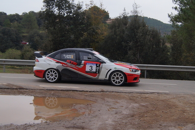 Carles Llinas - Kiko Torra
54º Rallye 2000 Viratges 2014. Mitsubishi Lancer Evo X.
Clasificado 3º.
El Rally tenia 88.26 Km cronometrados divididos en 10 tramos.
Tomaron la salida 99 equipos, 60 de ellos para el Campeonato de Catalunya Velocidad, 27 Regularidad y 12 de ECOseries.
Foto en B2 Vilaredes.
Palabras clave: 2000_Viratges;Manresa;Biela_Club_Manresa;2014